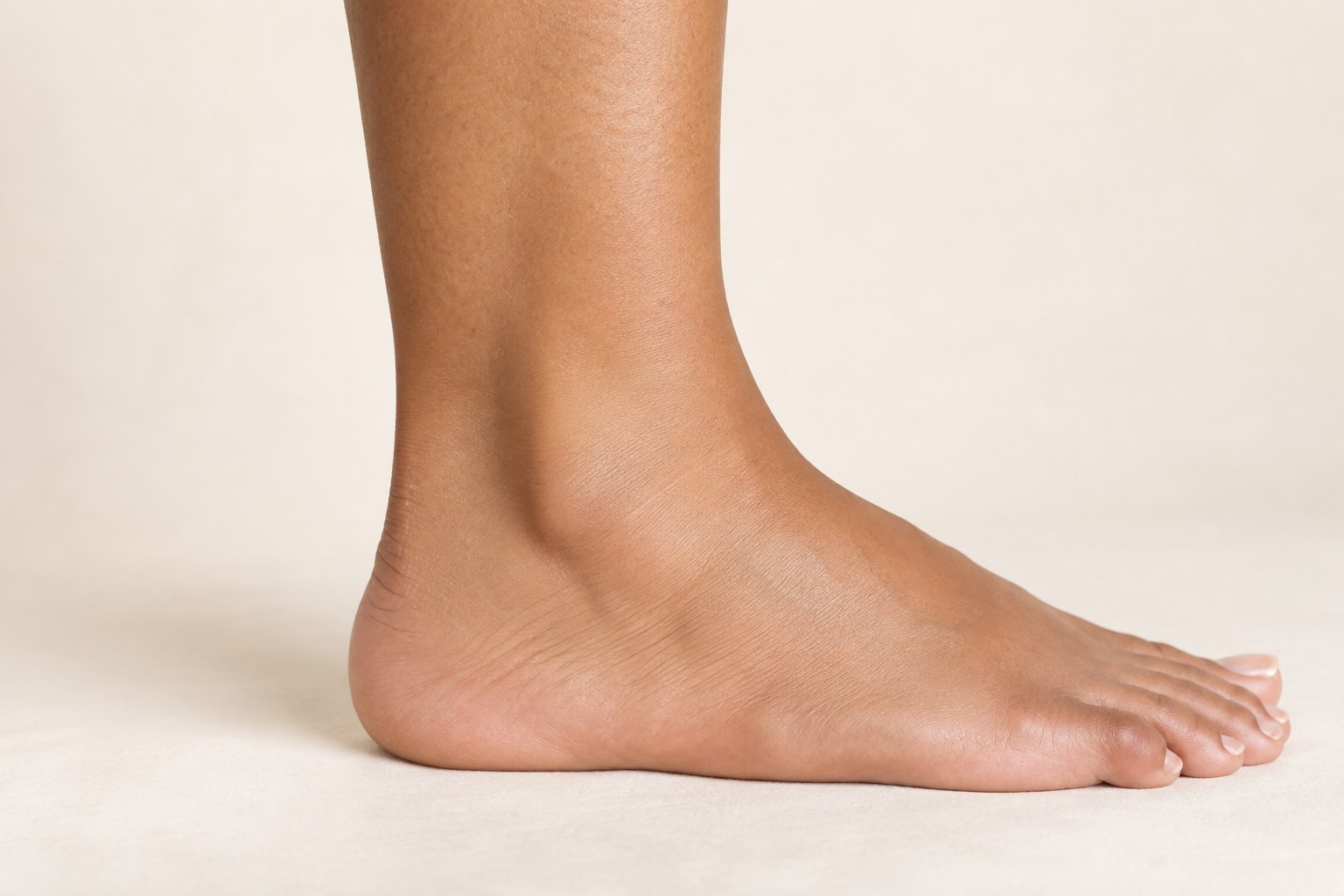 Ankle placement reference, female adult AI model, no tattoo applied