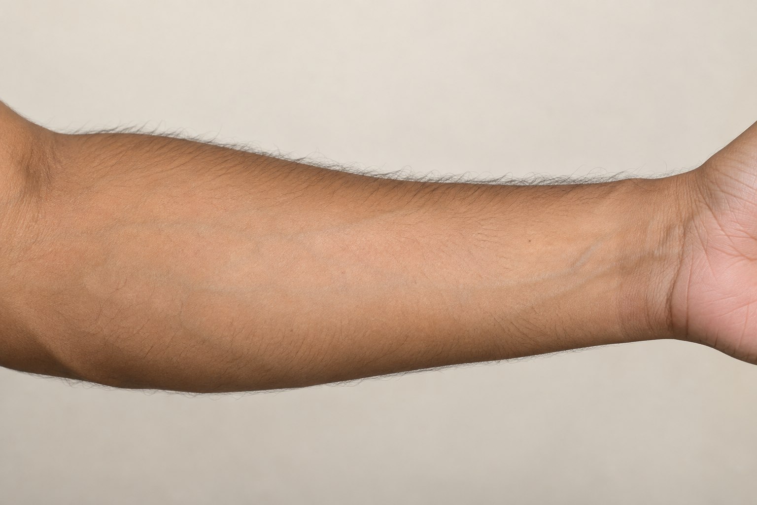 Forearm placement reference, male adult AI model, no tattoo applied