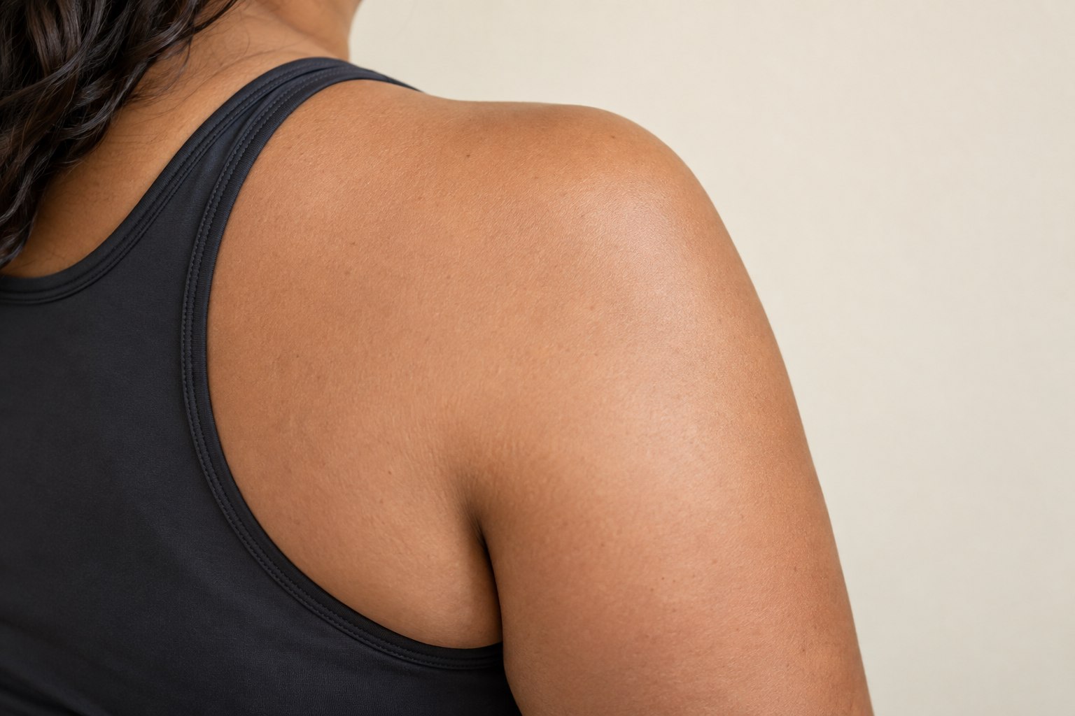 Shoulder placement reference, female adult AI model, no tattoo applied