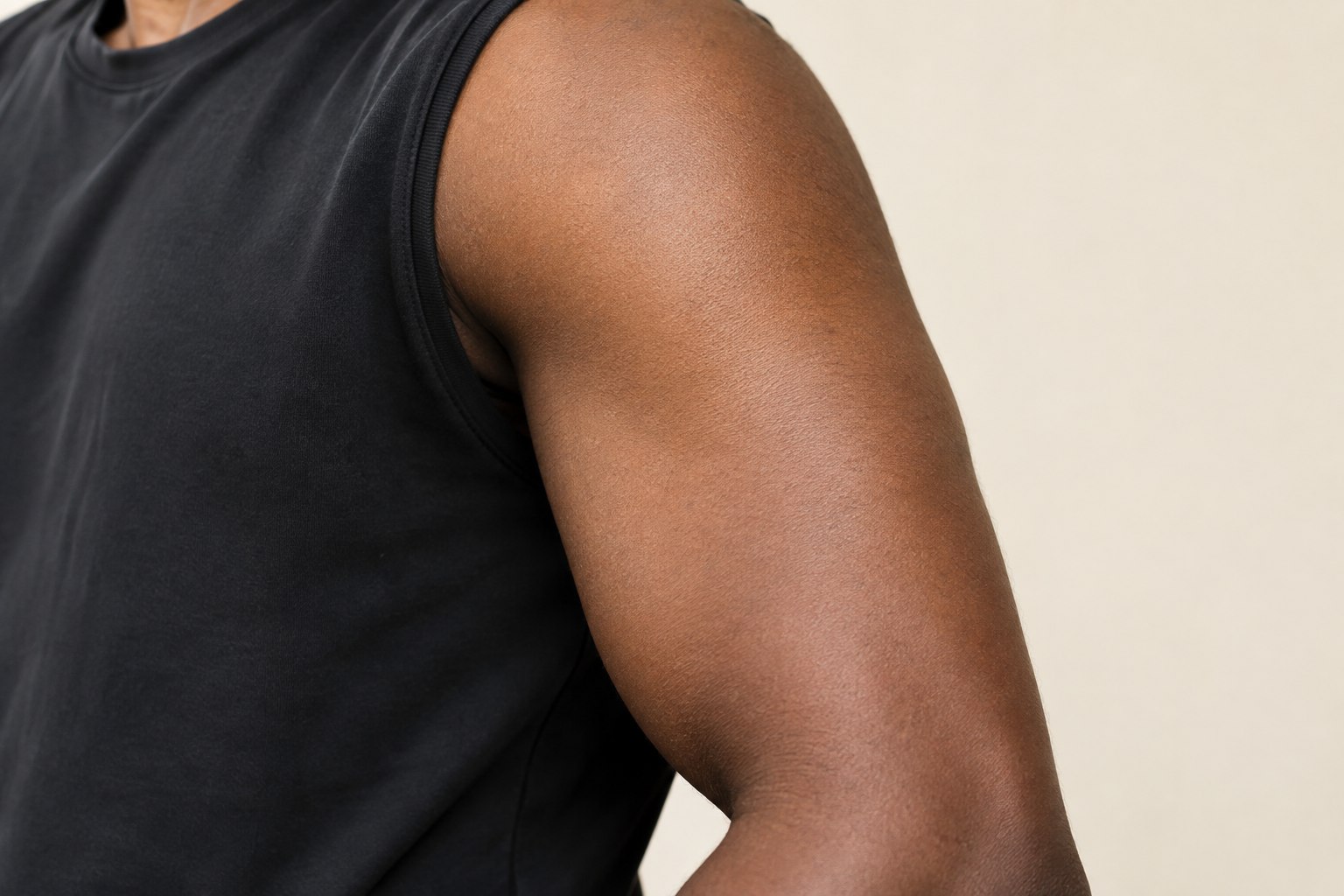 Upper Arm placement reference, male adult AI model, no tattoo applied